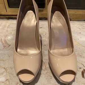 Stuart Weitzman patent nude peel toe pump